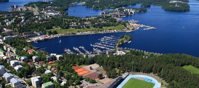 Lappeenranta photographed from above, lake, trees and buildings.